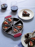 EXCLUSIVE Available now! - LODGE Seasoned Cast Iron Wedge Pan with INCLUDED set of 2 Silicone GRIPS